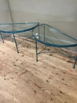 A pair of conservatory green metal demi-lune conservatory tables with glass inset service and on