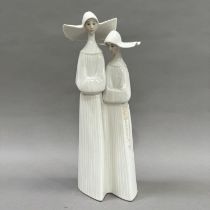 A Lladro figure group of two nuns, 33cm high