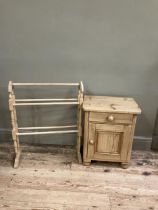 A pine pot cupboard, a drawer above a single door on turned bun feet together with a pine towel rail