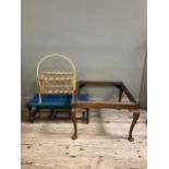 A bamboo magazine rack, an oak stool with blue and green nylon seat and a large mahogany stool frame