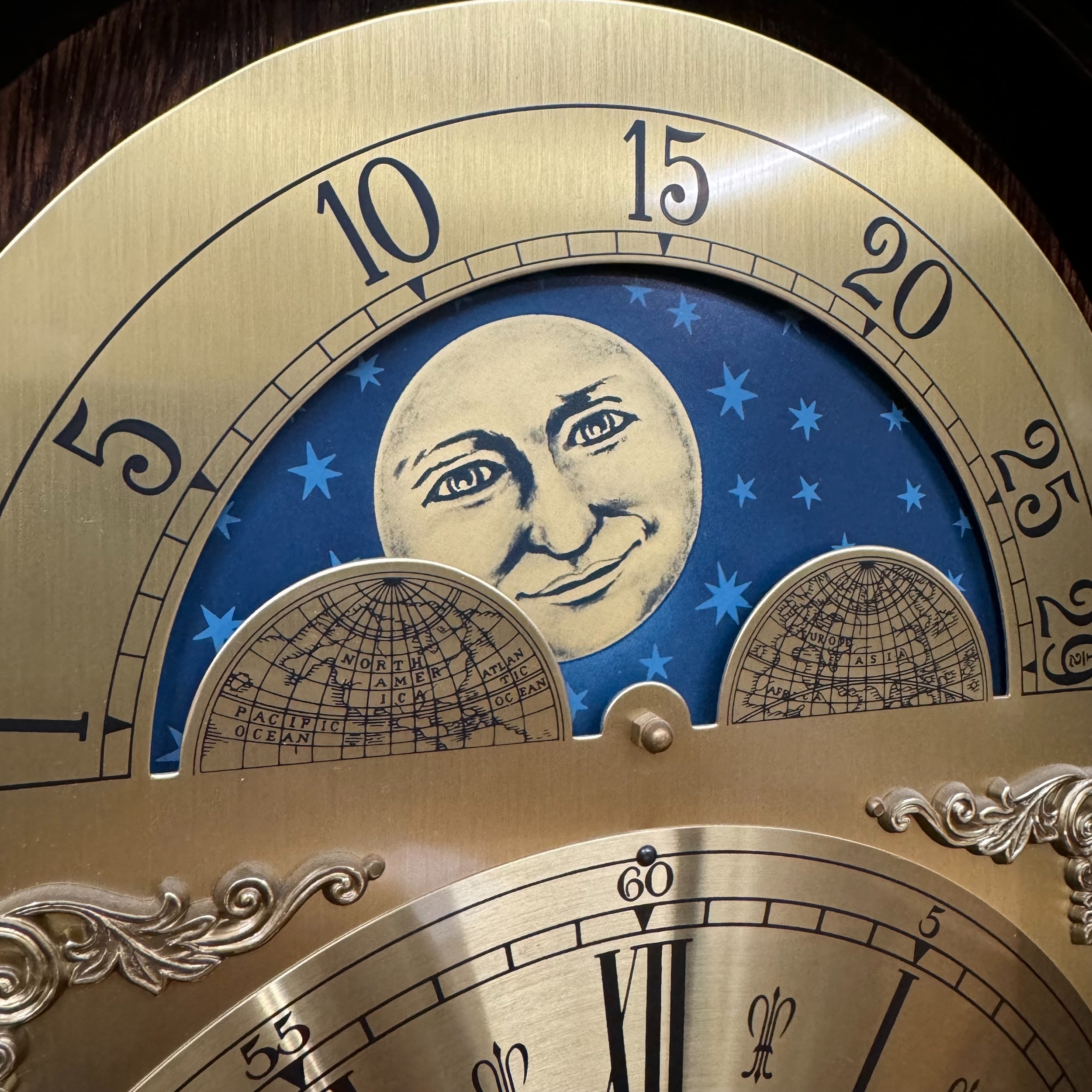 A reproduction mahogany longcase clock having an arched dial with moon phase, the chaptering with - Image 2 of 3