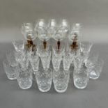 Part suites of glass including ports, whiskies, brandies and a set of eight hock glasses with