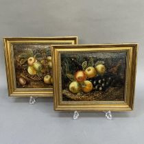 In the style of Henry Clare, a pair of still life of fruit, apples in a basket, apples and grapes
