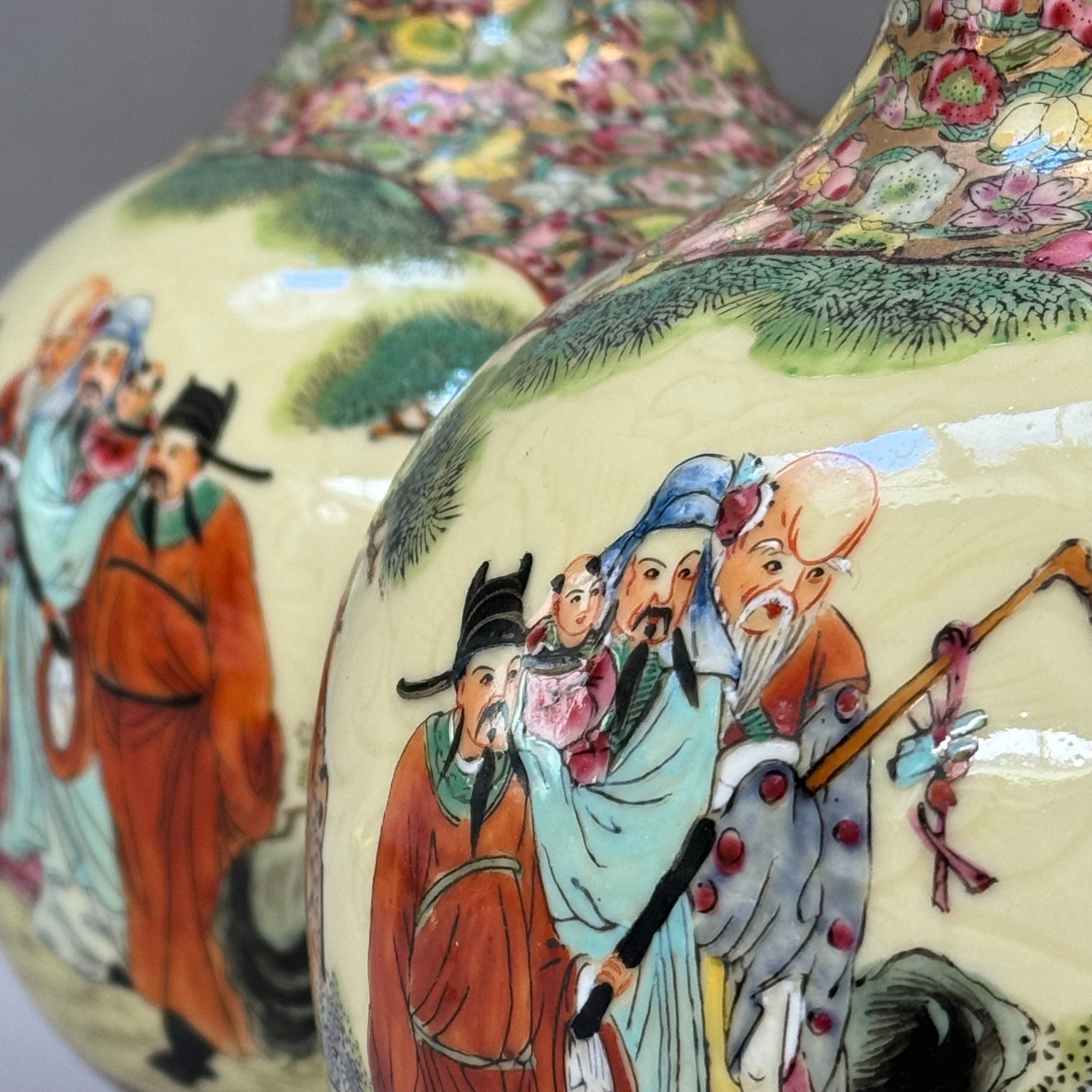 A pair of Chinese vase shaped table lamps painted with dignitaries in a garden landscape against a - Image 2 of 3