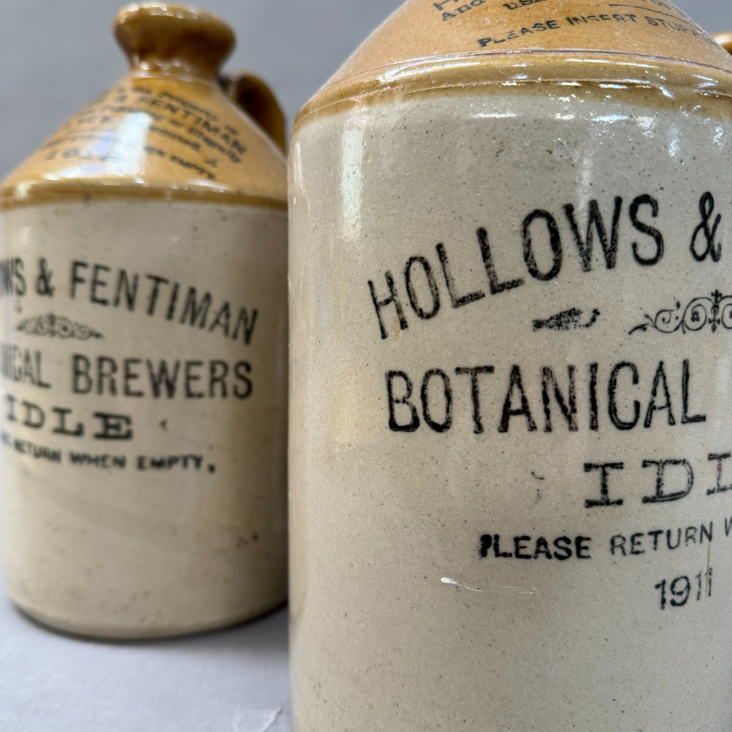 Two stoneware brown dipped stone ware flagons lettered for Hollows and Fentiman botanical brewers, - Image 2 of 4