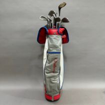 A set of golf clubs, various, contained in a Slazenger golf bag