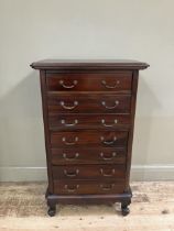 A reproduction hardwood chest of one single drawer and three double fronted drawers with swing