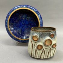A modern cloisonné bowl of circular shallow form, the blue enamel ground worked with flowers, 20cm