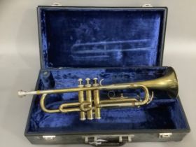 A brass trumpet in fitted case