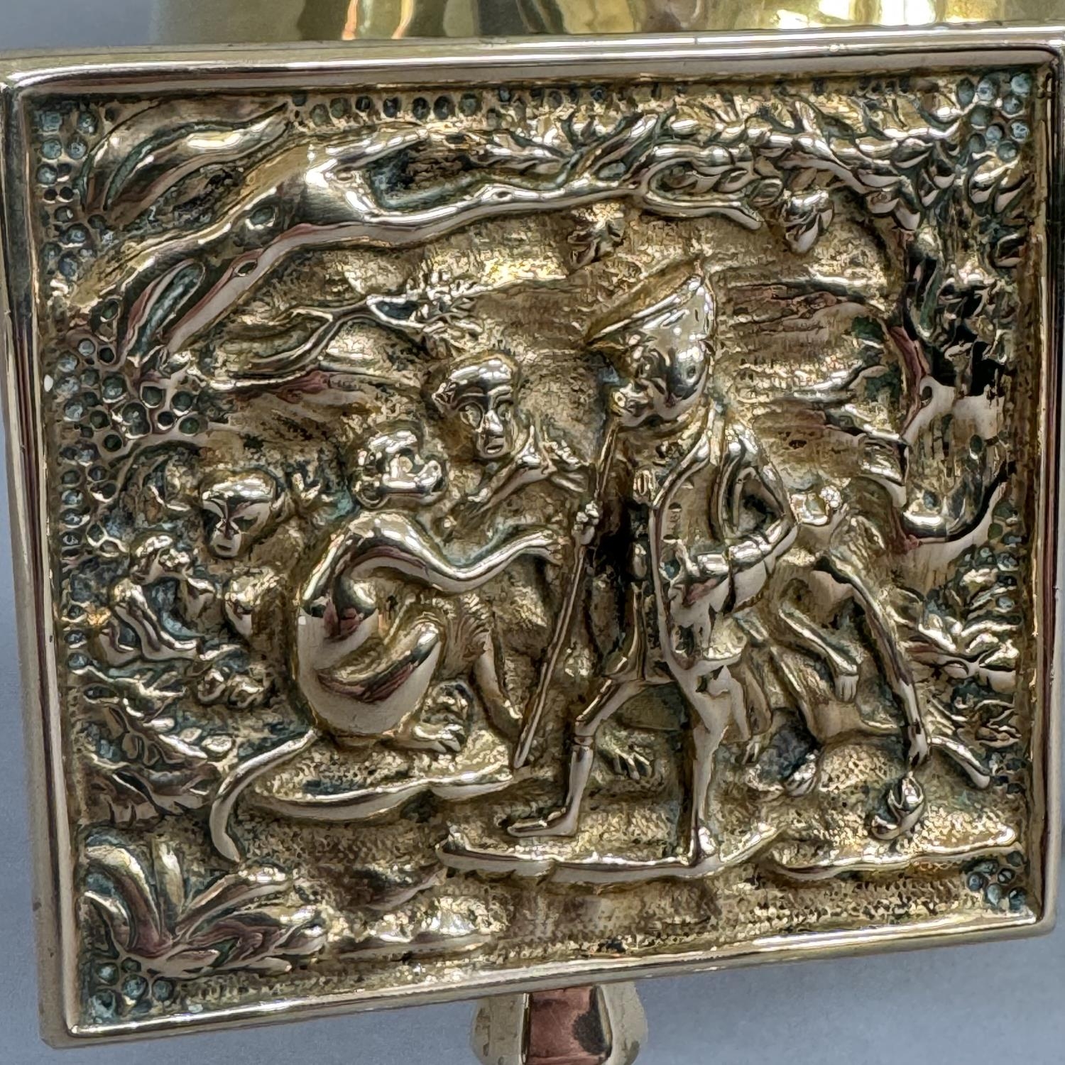 A brass miniature tilt-top tripod table, the panel cast in relief with monkeys, 15.5cm high, - Image 2 of 3