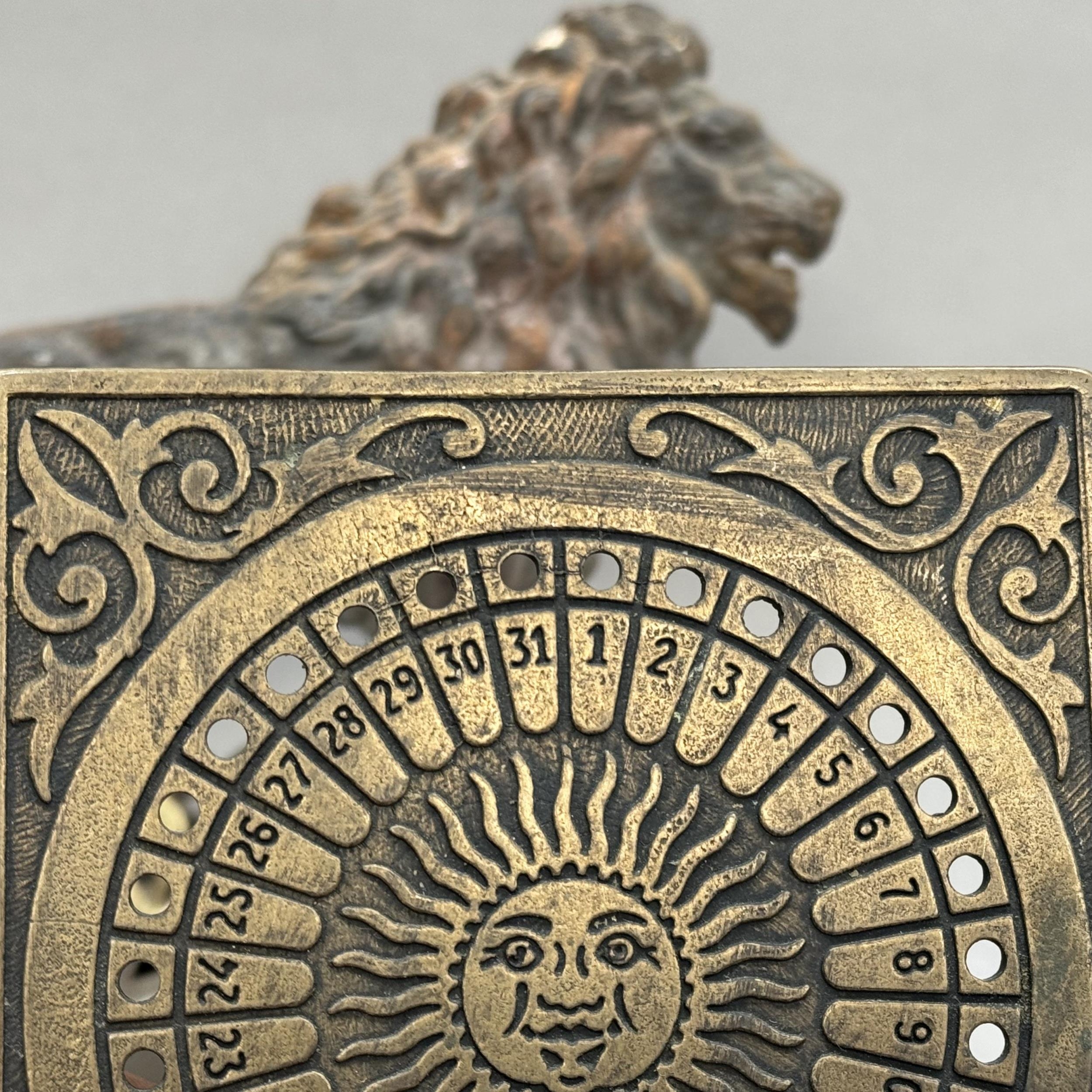 A Victorian cast iron door stop or hearth ornament in the form of a lion, with the British lion - Image 3 of 3