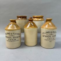 Two stoneware brown dipped stone ware flagons lettered for Hollows and Fentiman botanical brewers,