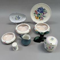 A collection of Poole pottery including three posy bowls, preserve pot, cruet, cream jug and deer