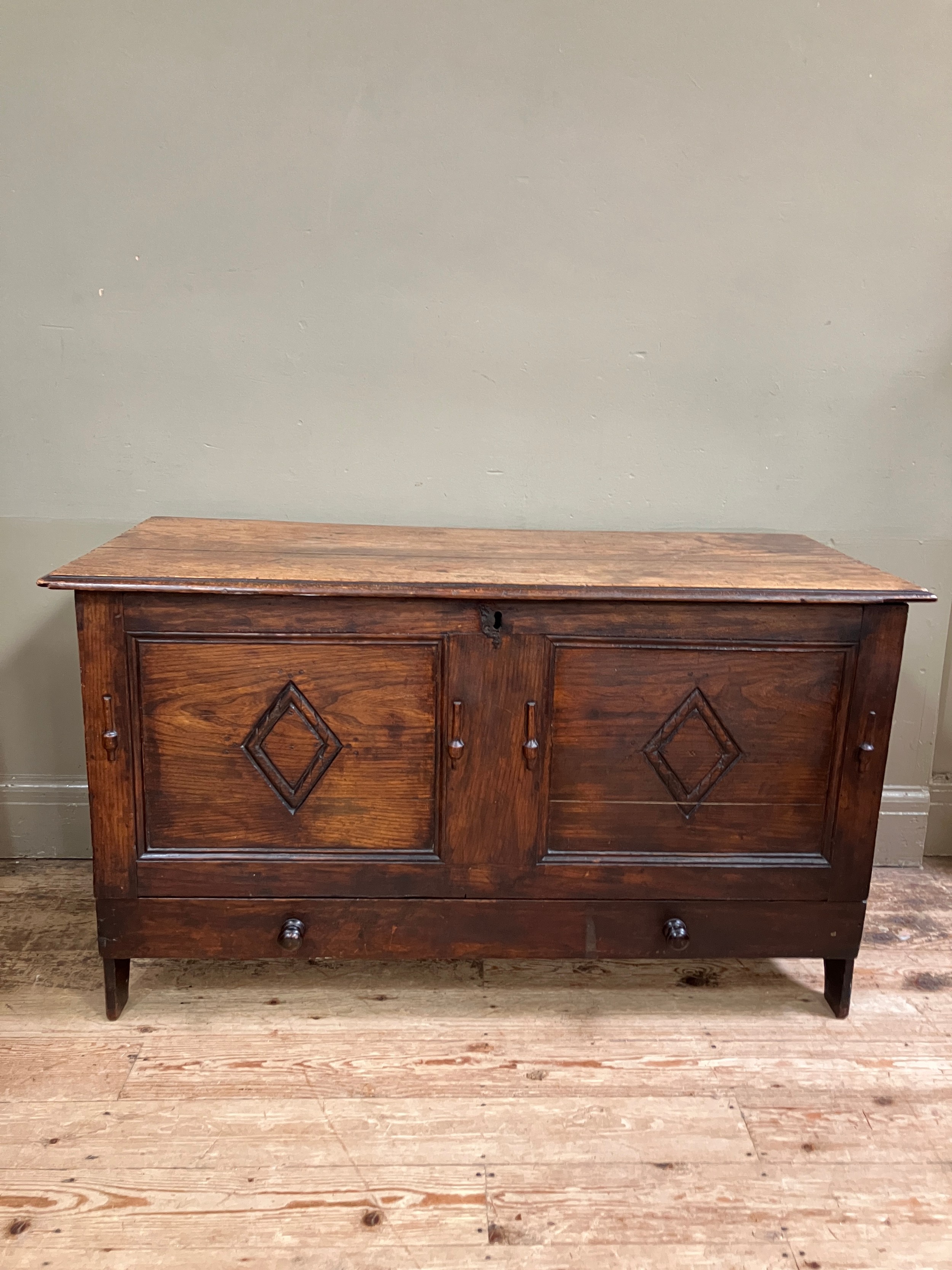 A 19th century oak kist having a twin indented panel front with diamond motifs on panel shaped - Image 2 of 3