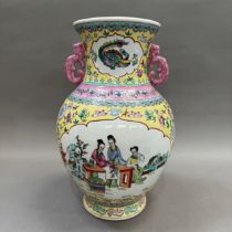 A20th/21st century Chinese two handled vase painted with Bijin in a garden landscape in mirror