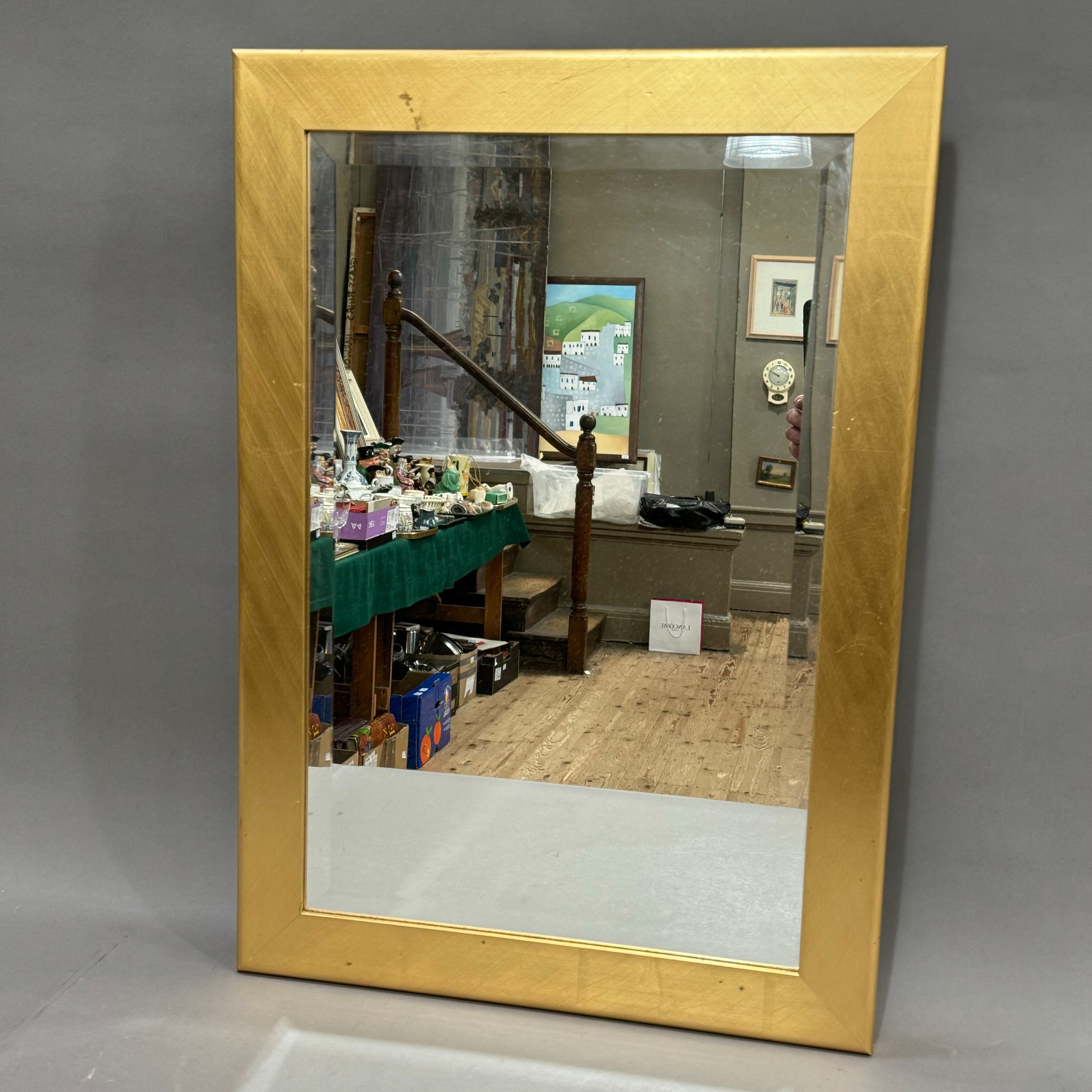 A gilt framed bevelled mirror, rectangular, 78cm x 54cm