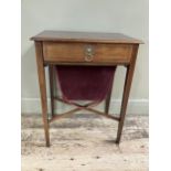 An Edward VII mahogany and satinwood banded work table, rectangular, having a drawer and fabric