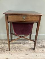 An Edward VII mahogany and satinwood banded work table, rectangular, having a drawer and fabric