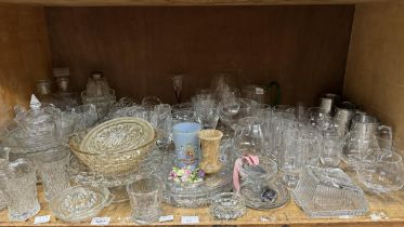 A large quantity of moulded and other glass including cake stands, fruit dishes, trifle dishes,