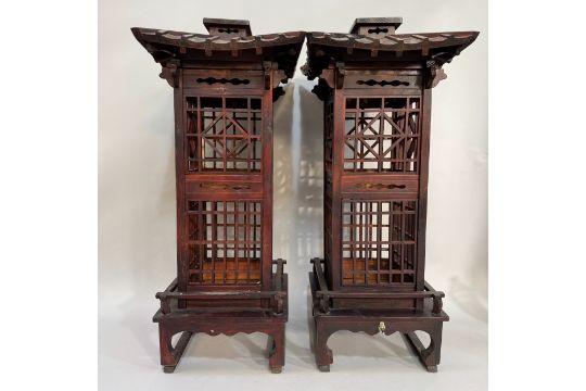 A pair of Chinese fretwork floor standing lanterns of pagoda style, 81cm (please note, no electrical - Image 1 of 2