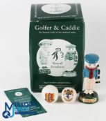 Royal Doulton Dunlop Man ltd ed Figure caddie and golfer numbered 277/2000, height 13.5cm, overall