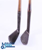 2x Indistinctly stamped interesting smooth faced irons incl' a heavy sand iron stamped R Forgan &