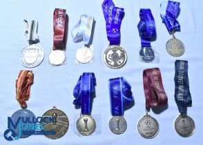 Twelve gilt and chrome replica Football Medals and Lanyards - 1986/1990 World Cup, 2005 Champions