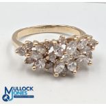 Yellow Gold Diamond Spray Ring stamped 14KP. Claw set with 10 marquise cut diamonds and 14 round