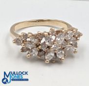 Yellow Gold Diamond Spray Ring stamped 14KP. Claw set with 10 marquise cut diamonds and 14 round