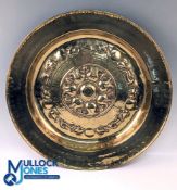 Large Antique Brass Embossed Alms Dish Plate with inscription, has signs of age-related wear,
