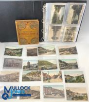 A postage stamp album with franked Victorian world stamps and a postcard album with over seventy