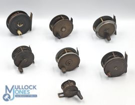 A collection of alloy and brass reels 3 1/2" to 1 1/2", made up of: 2x crank wind reels; 5x plate