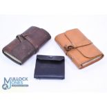 A collection of leather fishing wallets, as follows: Unnamed light tan wallet with wrap around