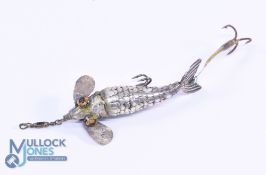 A contemporary artisan made articulated metal lure in the Gregory style. 2" body with paste eyes