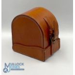 A fine unnamed large block leather 'D' reel case, burgundy lining, 4" x 2", excellent strap,