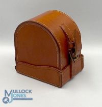 A fine unnamed large block leather 'D' reel case, burgundy lining, 4" x 2", excellent strap,