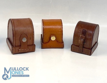 A collection of block leather 'D' shape reel cases, as follows: Unnamed green lined 3.5" case with