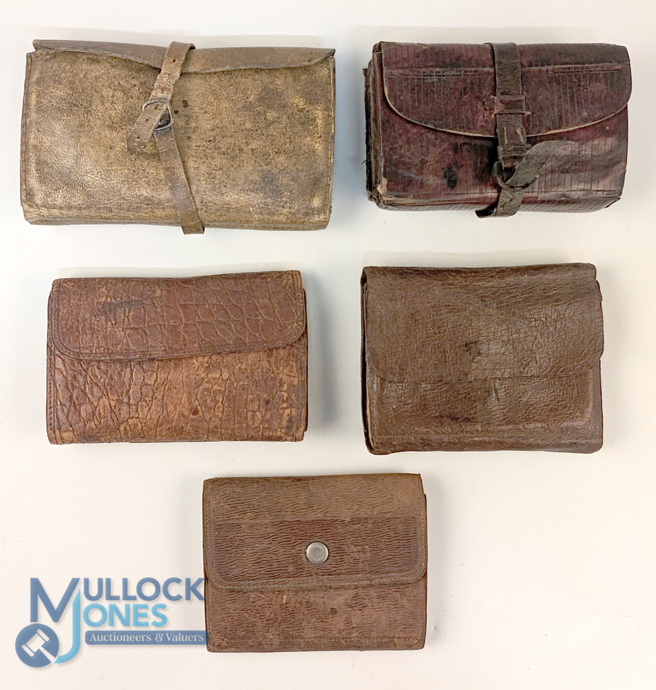 A collection of unnamed leather wallets: 7" x 4", 2 pockets and sleeves. 6" x 4", 18 pockets,