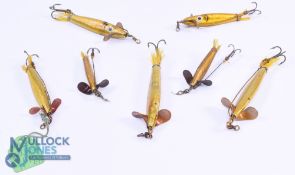 Collection of 7 Hardy Golden Sprat Devons, including 2 early models with painted eyes, sizes range