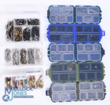 A collection of 8 Mustad small tackle boxes with a quantity of hooks, swivels, clips, spinners and