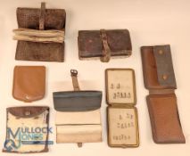 Another selection of unnamed leather fishing wallets, as follows: 5" x 4" with 20 pockets, sleeves