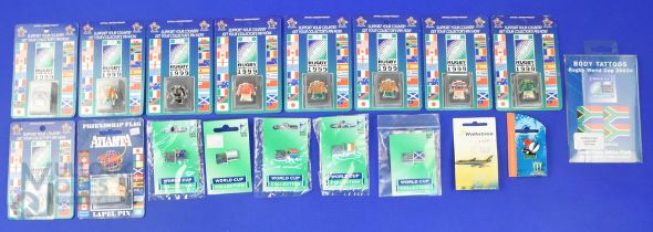 Mostly 1999 and 2003 RWC Official Rugby Lapel Badges (18): National kits, new in bubble packs,
