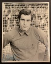 Peter Shilton signed black and white photograph having another 14 autographs on the back to