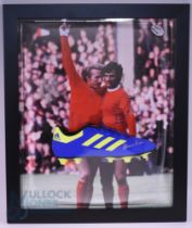 Dennis Law Manchester United Signed Football Boot: a modern blue boot framed and mounted in front of