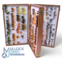 A fine Collection of Salmon Flies contained within a mahogany double hinged fly box, measures 15x8.