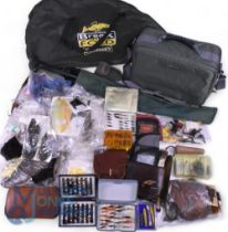Large collection of fly tying materials, including feathers, threads, capes, assorted fly boxes