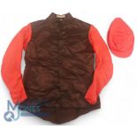 Horse Racing Silks and Colours. Black body, red sleeves by Race Equipment with red cap by D