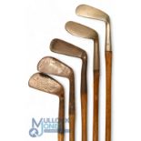 5x Assorted Irons inc' Fourlis patent flat soled round topped niblick, Genie deep faced mashie by