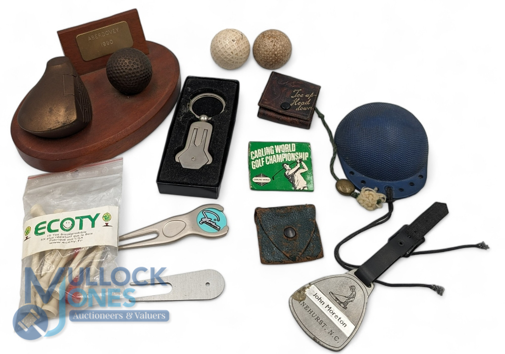 Golf Collectables: to include a rubber Britmarine golf ball cleaner, leather tee holders, 1990