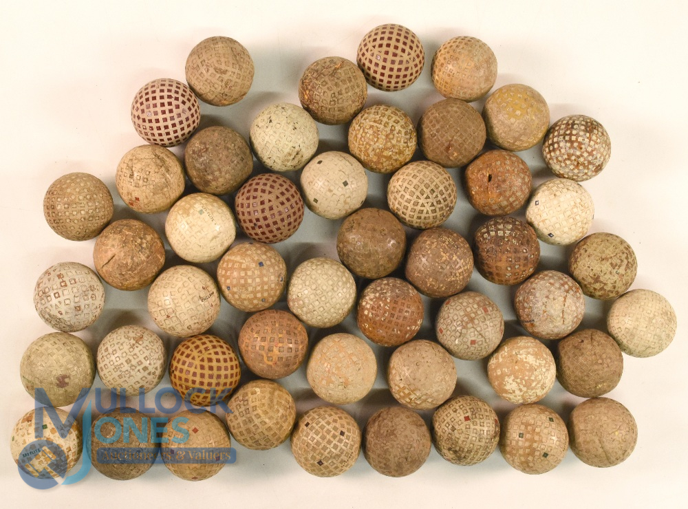 Large Quantity of square dimple and lattice patterned covered rubber core Golf Balls (used)
